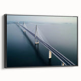 Framed canvas artwork showcasing a scenic landscape view of a bridge, featuring rich colors and intricate details, set against a black frame for a modern touch.