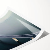 Rolled print showcasing a vibrant landscape bridge design, featuring lush greenery and a serene river scene, rolled for easy transport and storage.