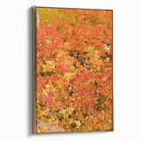 Framed canvas featuring a vintage landscape painting with autumnal trees in gold and black tones.
