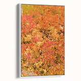 Vintage poster art featuring a fall scene with colorful leaves on a black background, framed canvas.