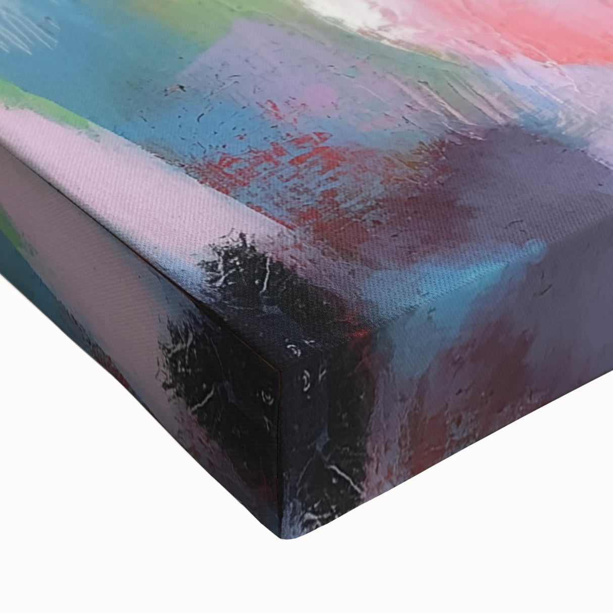 Close-up of a stretched canvas featuring an abstract geometric design in vibrant colors, showcasing intricate patterns and textures ideal for modern home decor.