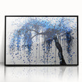 Framed acrylic artwork showcasing an abstract design of colorful splatters on a black background, ideal for modern home decor. The piece adds vibrant energy and creativity to any space.