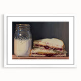 Abstract art print of assorted pastries in muted pastel tones on a framed white mat, ideal for dining room decor.