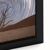 Framed canvas featuring a textured, colorful depiction of an African scenery with vibrant hues, ideal for living room decor.