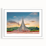 Abstract art print featuring a vibrant, multicolored landscape on a white framed canvas.