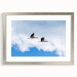 Textured abstract art print depicting Bhutan scenery in silver frame, ideal for bedroom art.