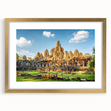 Extra large framed wall art featuring an abstract depiction of a Cambodian landscape in textured gold and earth tones.