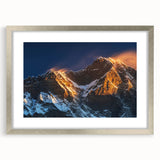 Textured art print of abstract Tibetan landscape in muted earth tones on a silver-framed mat, ideal for bedroom decor.