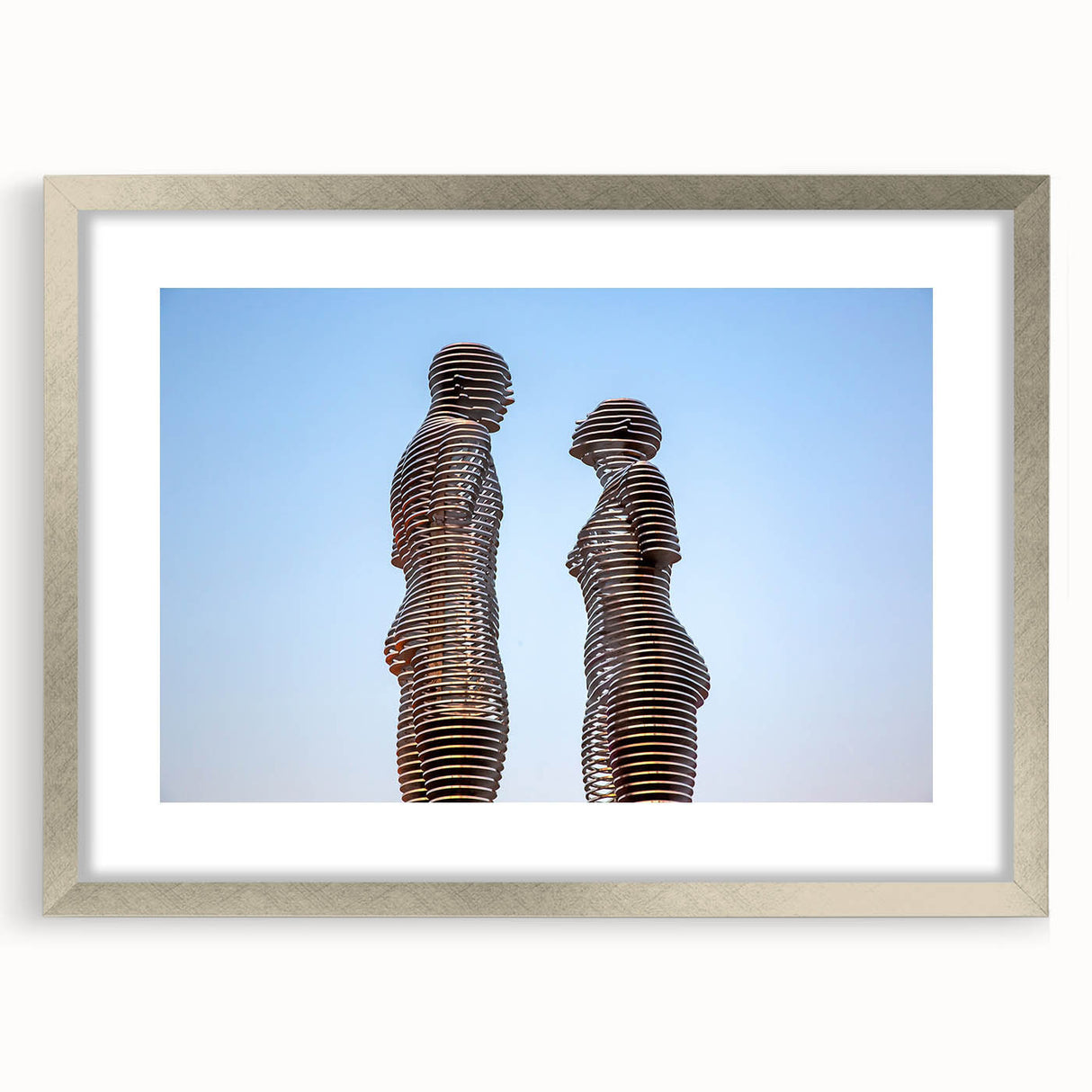 Textured abstract art print depicting a serene Georgian landscape in muted earth tones, framed in silver.