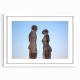 Abstract art print featuring a blend of muted earth tones on a framed canvas, ideal for dining room decor.