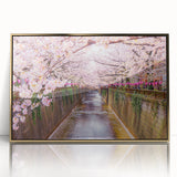 Large art print of a serene Japanese landscape in muted gold and green tones on framed acrylic.