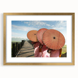 Extra large abstract art print depicting a textured scenery of Laos in muted earth tones, framed in gold.