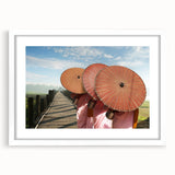 Abstract art print of a Laos scenery in muted earth tones, framed with a white mat, suitable for dining room decor.