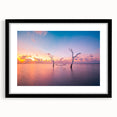Extra large abstract art print of Maldives scenery in vibrant colors on a textured canvas, framed in black.