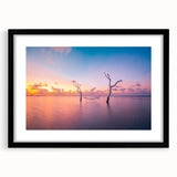 Extra large abstract art print of Maldives scenery in vibrant colors on a textured canvas, framed in black.