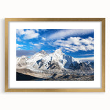 Extra large wall art featuring an abstract depiction of a Nepalese landscape in textured gold tones, framed with a mat.
