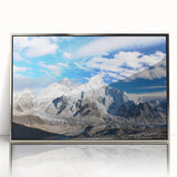 Mid-century modernist art depicting a serene Nepalese landscape in muted earth tones on a silver-framed acrylic print.