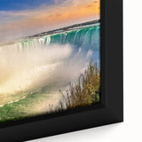 Close-up of black wall art featuring a textured, colorful abstract design on a framed canvas.