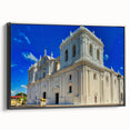 Black and white framed canvas featuring a vintage poster of a Nicaraguan landscape, ideal for bedroom wall decor.