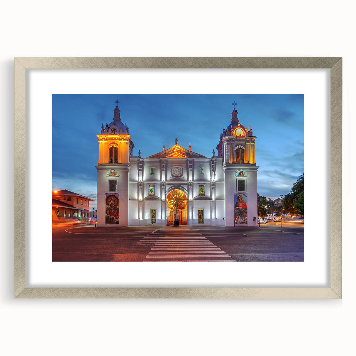Textured abstract art print of Central American scenery in muted earth tones, framed in silver, ideal for bedroom decor.