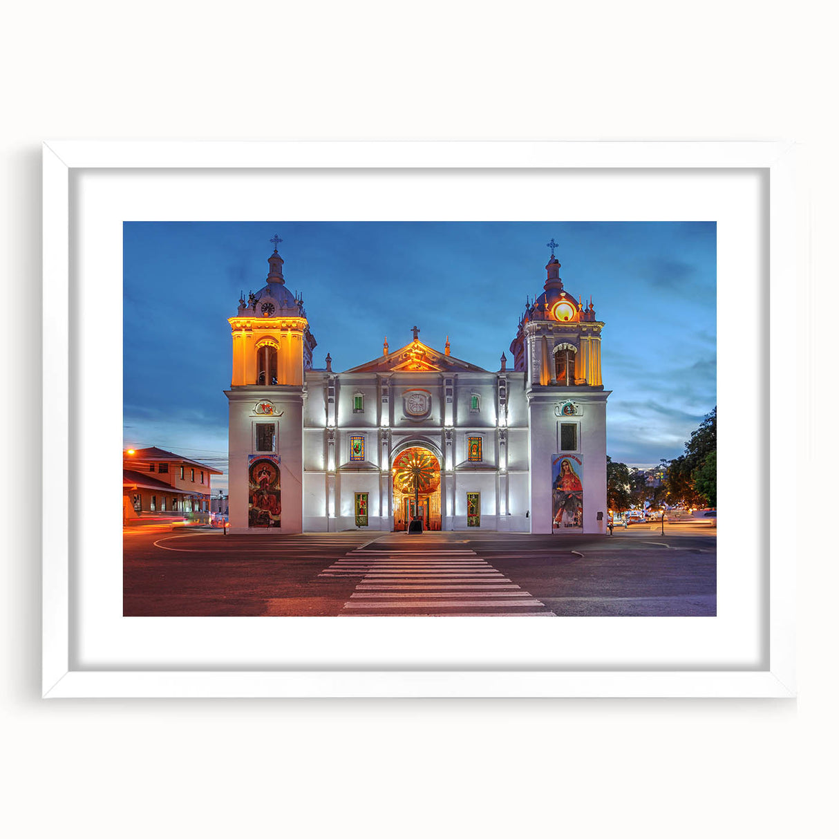 Abstract art print of a Central American scenery in muted earth tones, framed with a white mat.