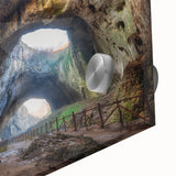 Large abstract wall art depicting a European landscape in muted earth tones on acrylic glass.