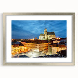 Extra large wall art featuring a textured abstract print of a European scenery in muted earth tones, framed in silver.