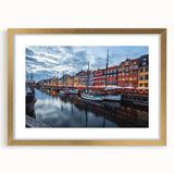 Abstract art print of a European scenery in Denmark, featuring muted earth tones on a gold-framed canvas.