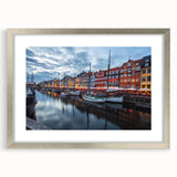 Extra large abstract art print depicting a textured European scenery in muted earth tones, framed in silver.