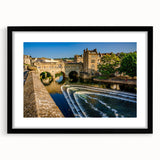 Extra large abstract art print depicting a colorful European cityscape in textured style, framed in black.