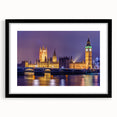 Abstract art print of a colorful London skyline, textured on a large black-framed canvas, ideal for living room decor.