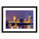 Abstract art print of a colorful London skyline, textured on a large black-framed canvas, ideal for living room decor.