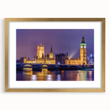 Abstract art print of London scenery in muted gold and blue tones on a framed canvas, ideal for dining room decor.