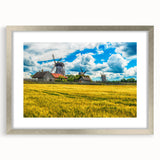 Extra large abstract art print featuring textured scenery of Europe, in muted earth tones, framed in silver.