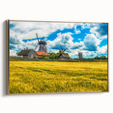 Framed canvas wall art depicting a vintage-style landscape painting of Estonia in muted gold and black tones.