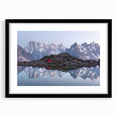 Abstract art print of the French Alps in vibrant, colorful hues on a large framed canvas, ideal for living room decor.