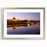 Abstract art print of Lyon scenery in textured tones of blue and gray on a large framed canvas.