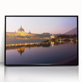 Large abstract wall art depicting a stylized Lyon cityscape in muted yellow and gray tones, acrylic print framed in black.