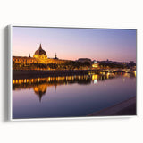 Vintage poster art of Lyon, France in vibrant colors on a framed canvas, ideal for living room decor.