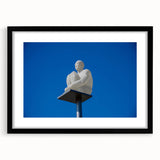 Extra large abstract art print of a colorful, textured European scenery on a framed black mat.