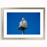 Extra large abstract art print of a textured European scenery in muted colors, framed in silver, ideal for living room decor.