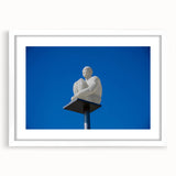 Textured abstract art print of Nice, France in muted earth tones on a white framed canvas, ideal for bedroom art.