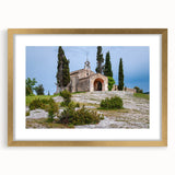 Abstract art print of a South France scenery in muted earth tones on a framed canvas, suitable for dining room decor.