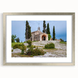 Extra large abstract art print depicting a textured French southern landscape in muted earth tones, framed in silver.