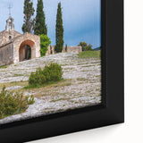 Extra large framed canvas depicting a textured scene of a southern French landscape in black with colorful accents.