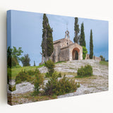 Large art depicting a serene South of France scenery on stretched canvas, featuring soft pastel colors.
