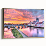 Framed canvas depicting a vintage-style landscape of Bavaria, Germany, in muted gold and black tones.