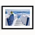 Extra large framed wall art of Santorini with vibrant blue and white hues, ideal for living room decor.