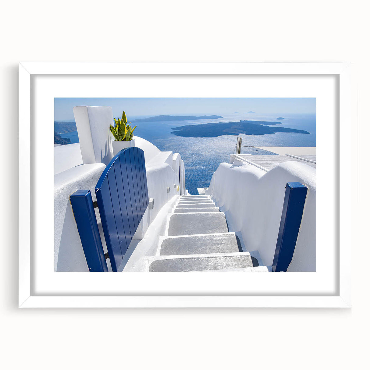 Textured art of Santorini with abstract blue and white hues on a framed white mat, ideal for bedroom decor.