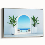 Framed canvas featuring a vintage-style landscape painting of a Greek seaside, with vibrant blue and white tones.
